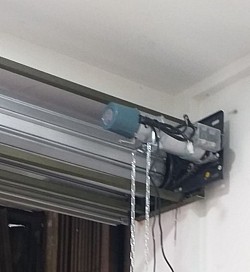 service rolling door otomatis murah